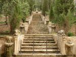 Steps with ornate carved figures at Raixa gardens Bunyola Majorca