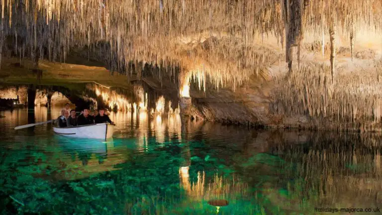 Crossing the underwater lake in the Caves of Drac Majorca