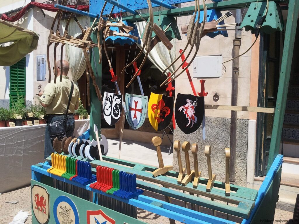Medieval style childrens toys at the market in Capdepera Majorca