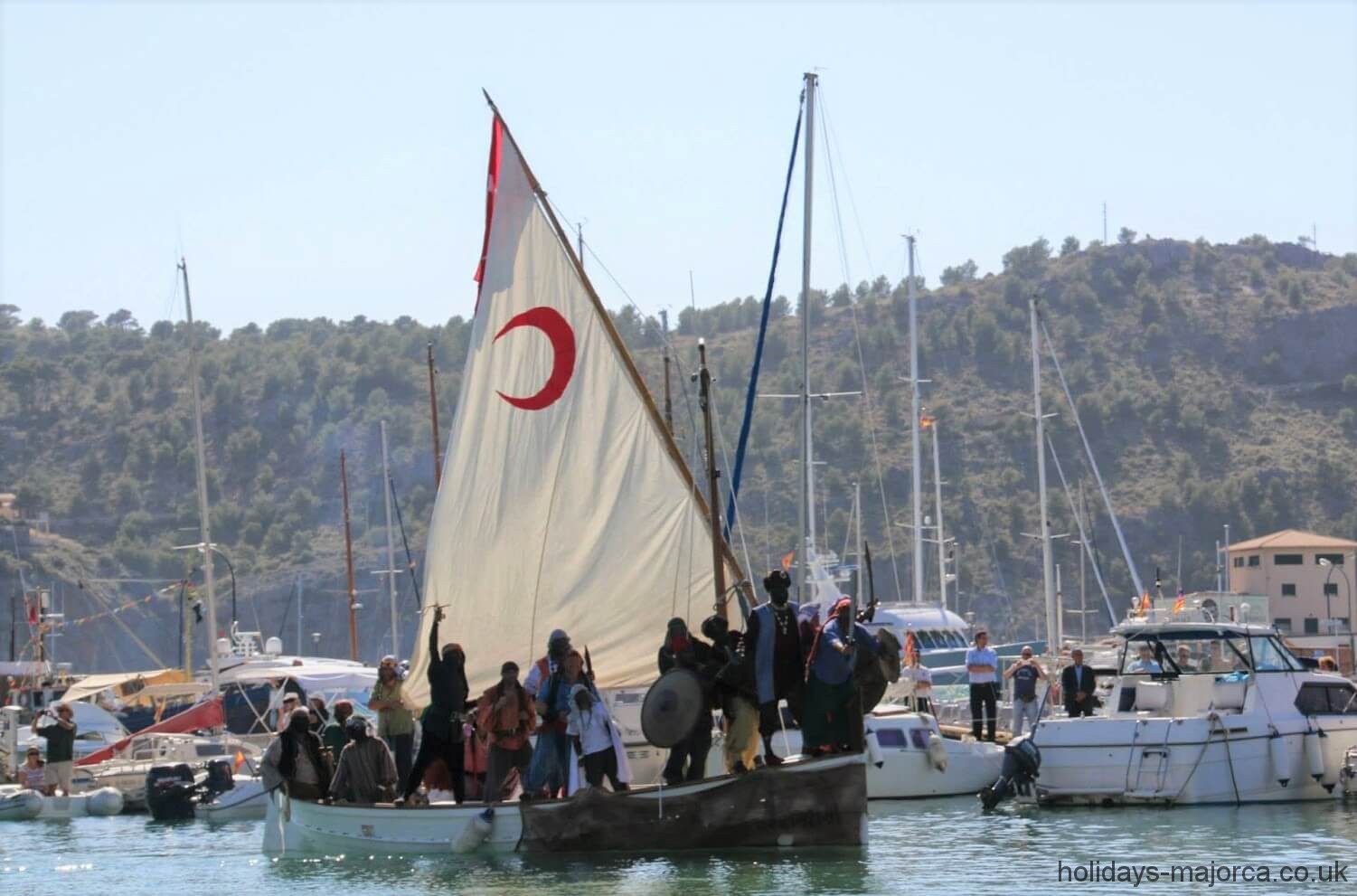 Moors sailing into port at the Christians vs Moors festival in Soller Majorca