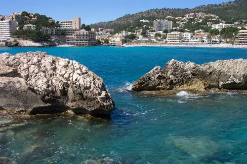 Peguera from a rocky outcrop across the bay