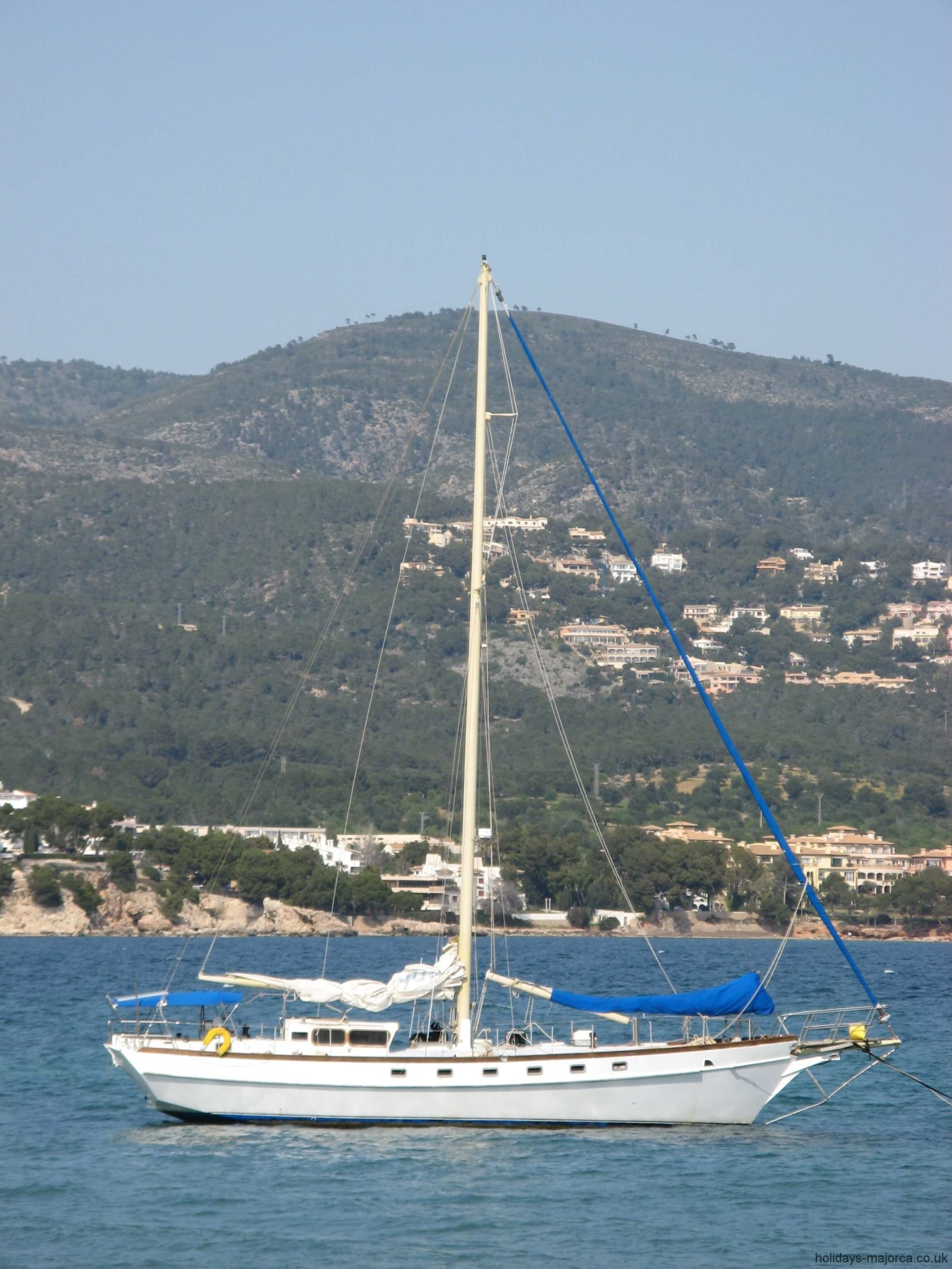 Portrait of sailing boat in Palma Nova bay Majorca