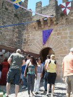The entrace to the Capdepera hilltop fortress during the medieval market celebration Majorca